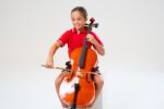 Young student playing a SOMON cello