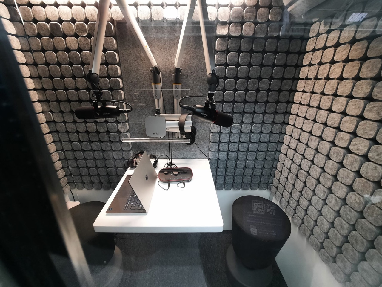 A two-person podcast setup